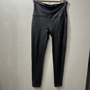 SPANX black faux leather leggings size XL.